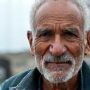 Portrait of Razif Abdullah, a professional fisherman satisfied with repair service