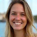 Portrait of Sarah Jenkins, a happy tourist who rented a boat