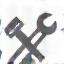 Wrench and screwdriver icon representing repair services